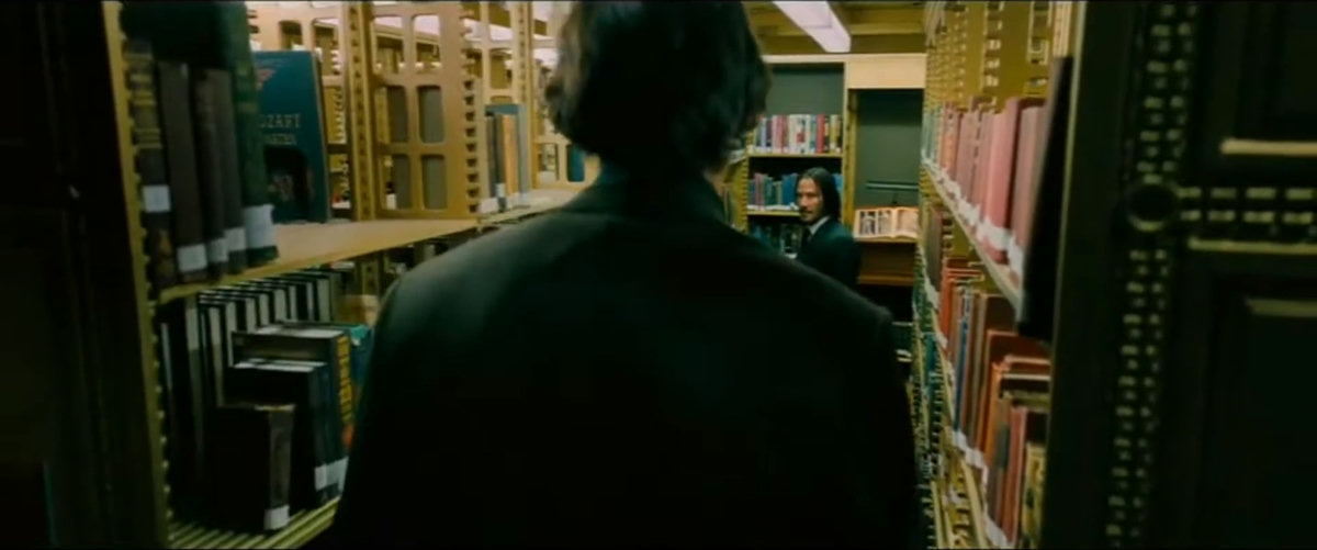 books, bookshelves, paper, window, tense, serious, focused, mysterious, standing, looking, searching, holding paper